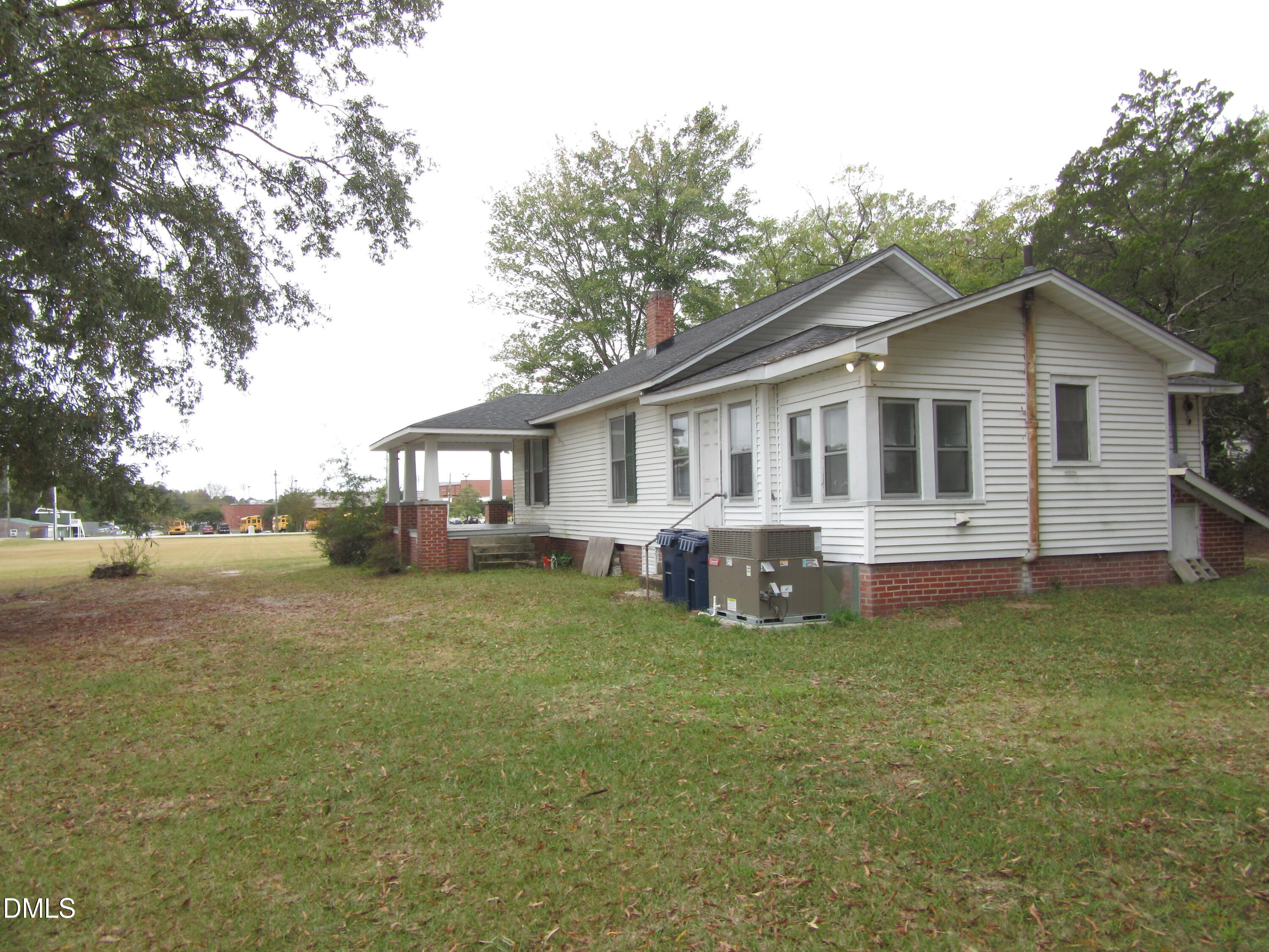 545 Main Street Bunn, NC 27508 - Photo 12 of 13 a view of a house with a yard