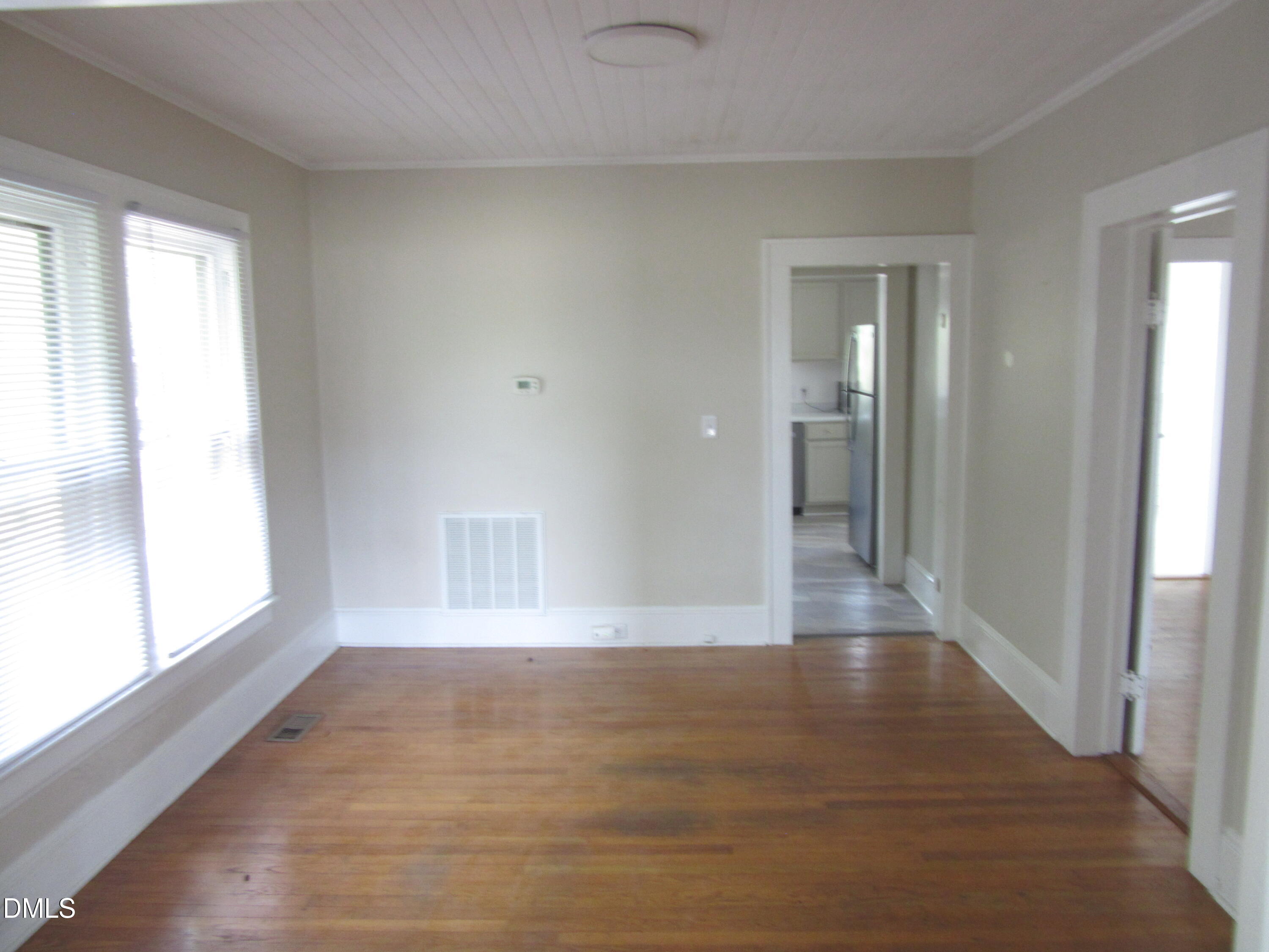545 Main Street Bunn, NC 27508 - Photo 3 of 13 a view of an empty room and window
