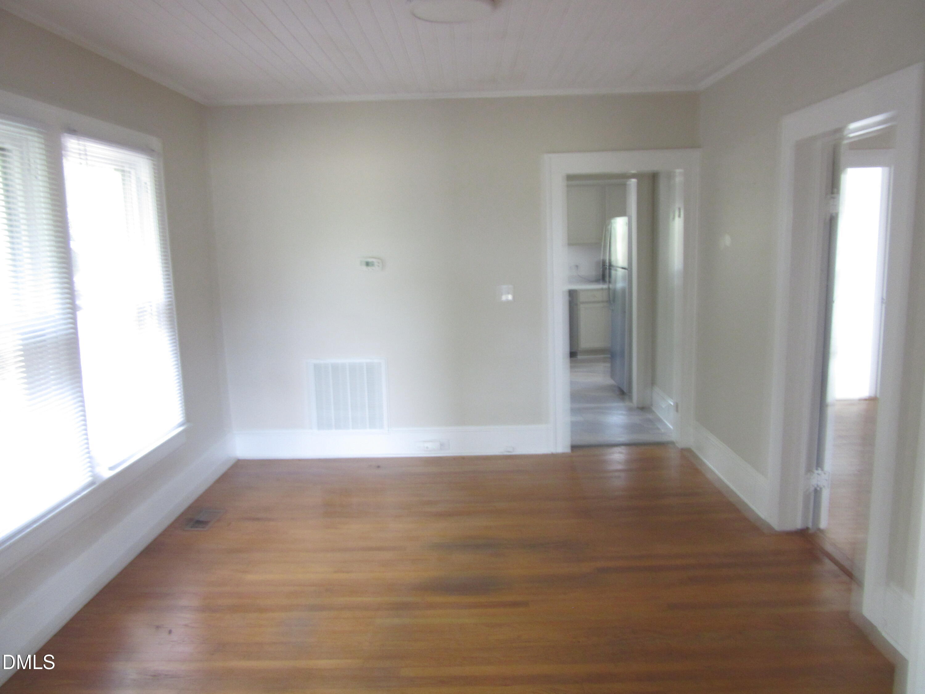545 Main Street Bunn, NC 27508 - Photo 4 of 13 a view of an empty room and window