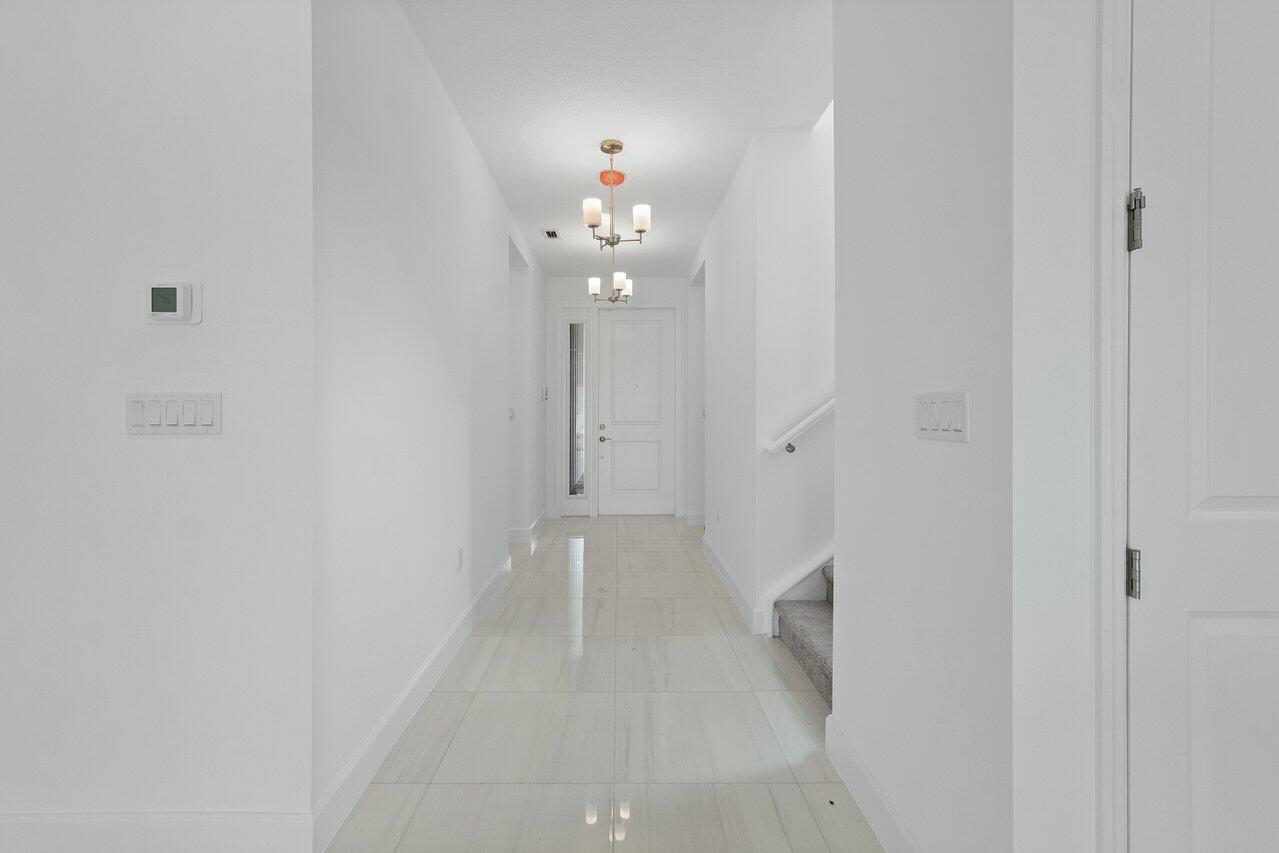 19159 Rolling Acrs Road Loxahatchee, FL 33470 - Photo 5 of 35 Hall Way View to Front Door