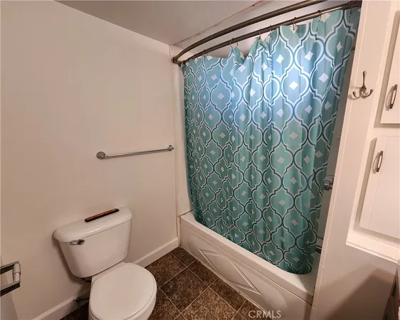 a bathroom with a sink vanity and a mirror