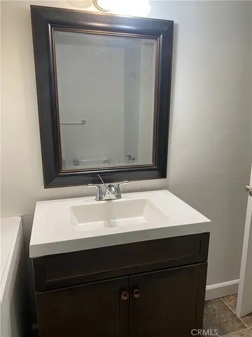 an empty room with a workbench