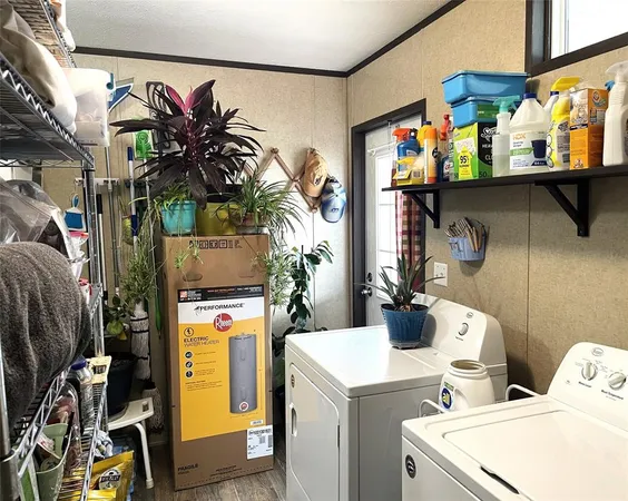 a utility room with dryer and washer