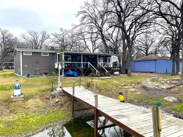 a view of a house with swimming pool