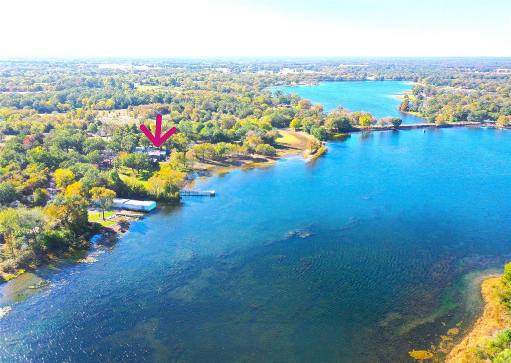 351 Club Lake Road Teague, TX 75860 - Photo 3 of 34 an aerial view of a houses with yard