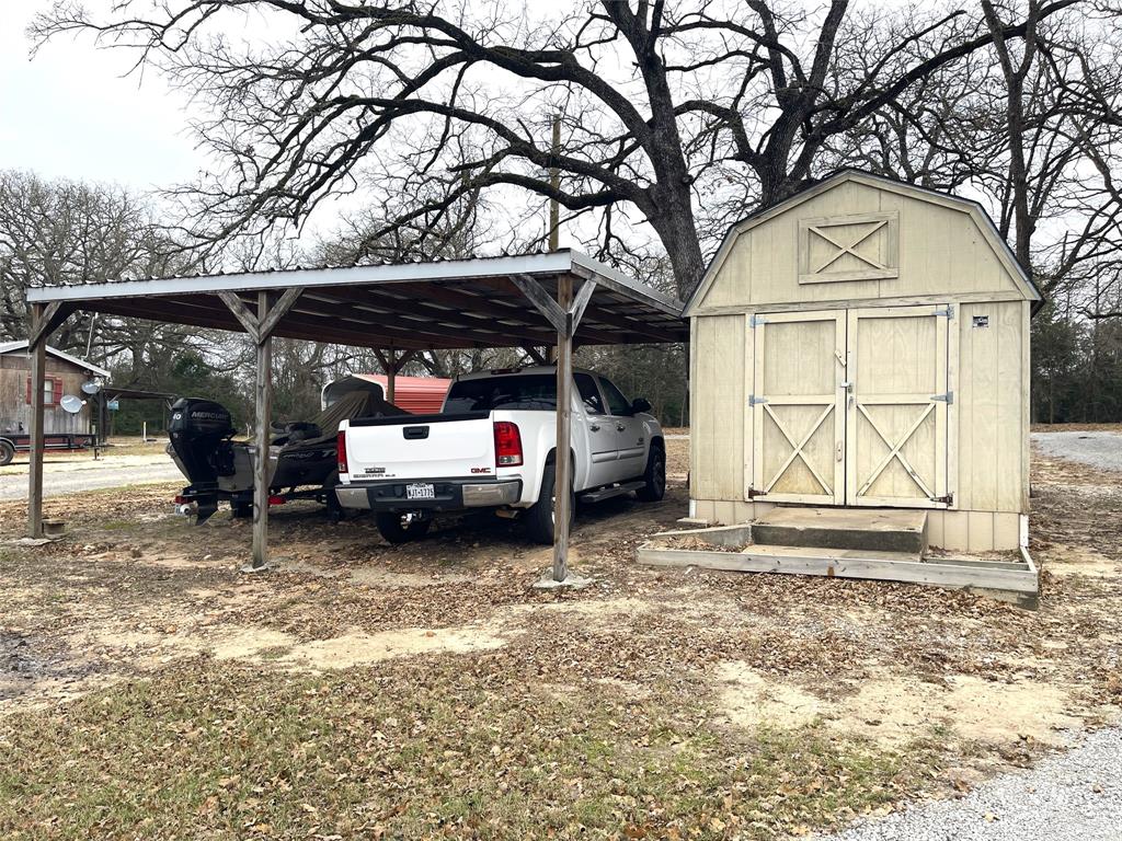 351 Club Lake Road Teague, TX 75860 - Photo 33 of 34 a view of a car park in front of house