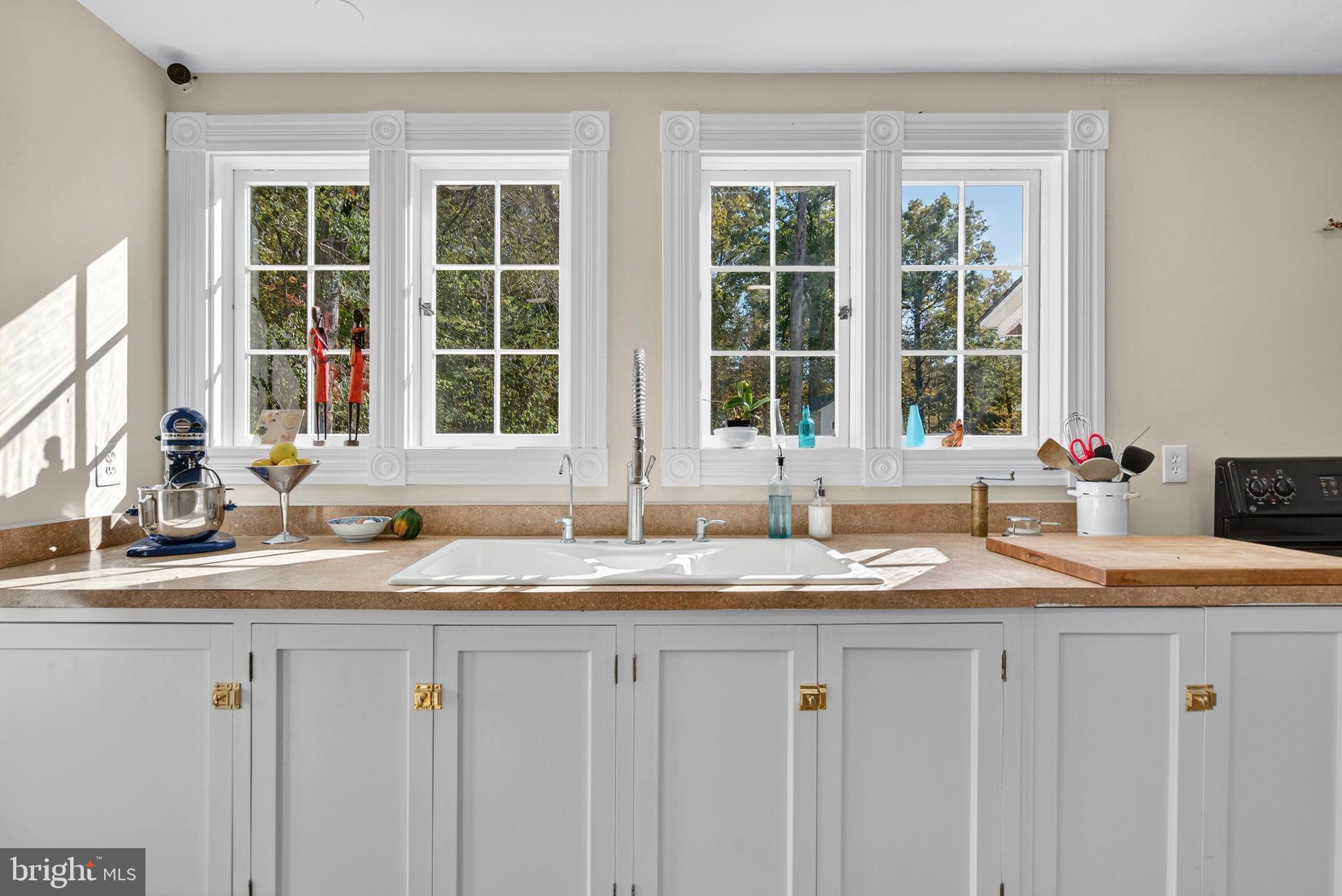 4559 Weston Road Catlett, VA 20119 - Photo 21 of 57 a kitchen with granite countertop sink and window