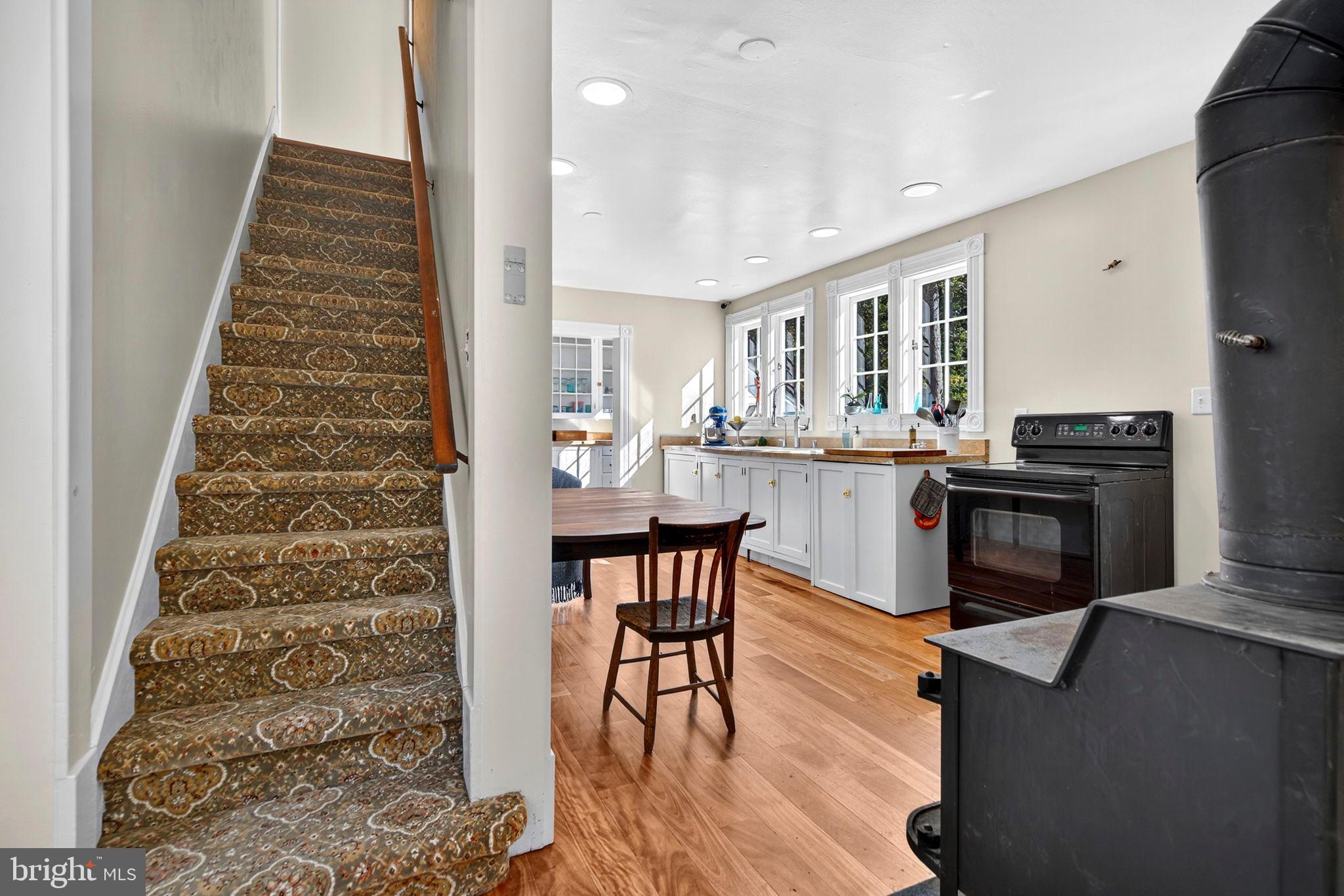 4559 Weston Road Catlett, VA 20119 - Photo 23 of 57 a kitchen with stainless steel appliances granite countertop a stove and a refrigerator