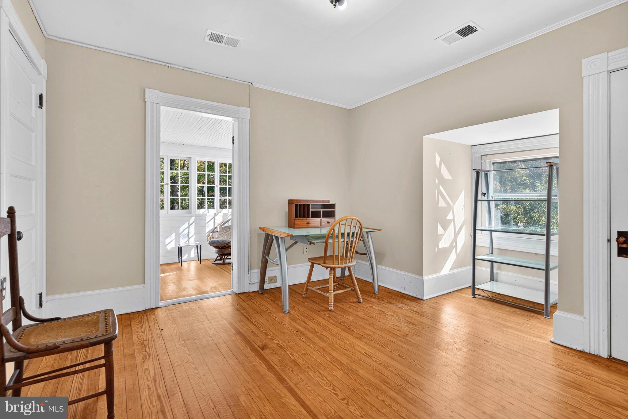 4559 Weston Road Catlett, VA 20119 - Photo 31 of 57 a living room with furniture and a wooden floor