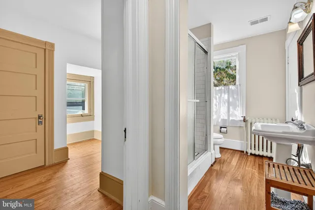 a view of a bedroom from a hallway