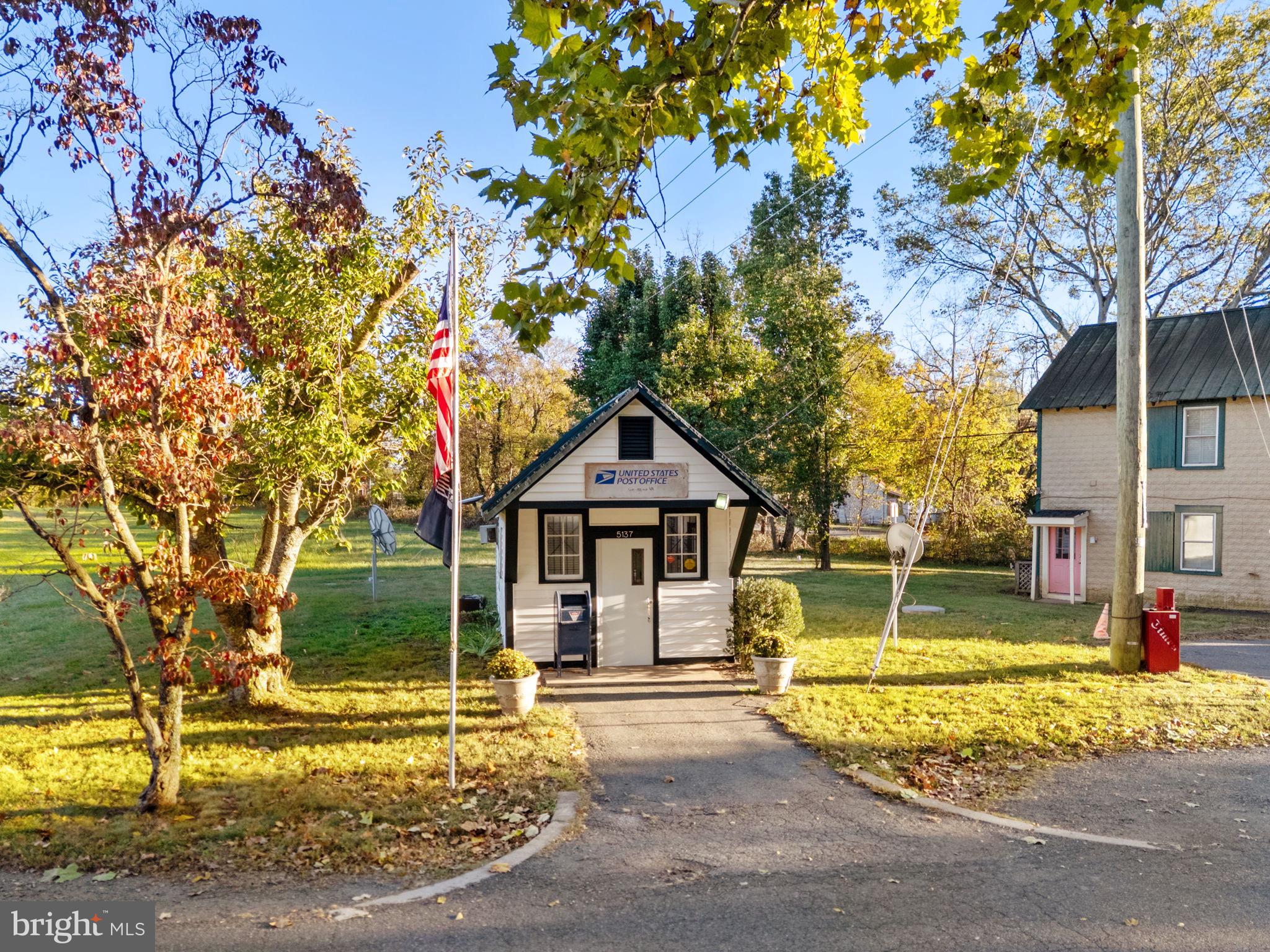 4559 Weston Road Catlett, VA 20119 - Photo 56 of 57 a view of a house with a large tree and a yard