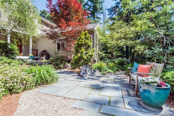 73 Ballardvale Road Andover, MA 01810 - Photo 3 of 26 a backyard of a house with seating space