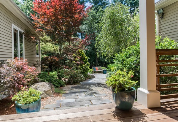 73 Ballardvale Road Andover, MA 01810 - Photo 5 of 26 a view of a backyard with potted plants