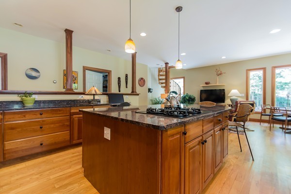 73 Ballardvale Road Andover, MA 01810 - Photo 8 of 26 a kitchen with stainless steel appliances granite countertop a stove a sink and a wooden floors