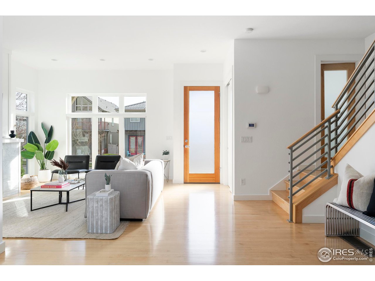 5247 5th Street Boulder, CO 80304 - Photo 34 of 34 a living room with furniture and wooden floor