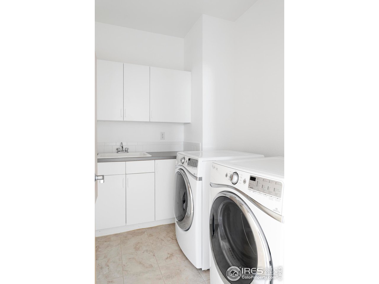 5247 5th Street Boulder, CO 80304 - Photo 21 of 34 a utility room with dryer and washer