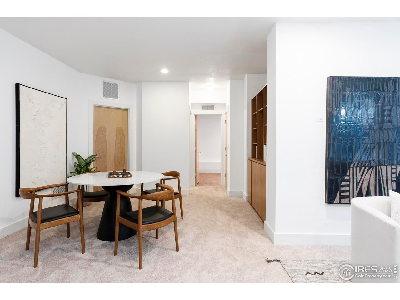 5247 5th Street Boulder, CO 80304 - Photo 24 of 34 a dining room with furniture and wooden floor