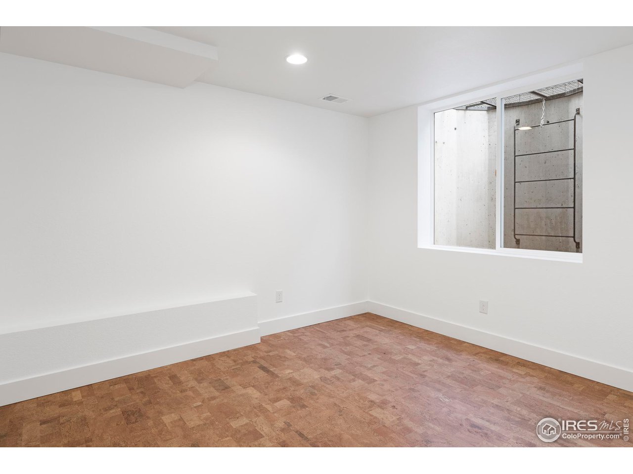 5247 5th Street Boulder, CO 80304 - Photo 26 of 34 a view of an empty room with a window