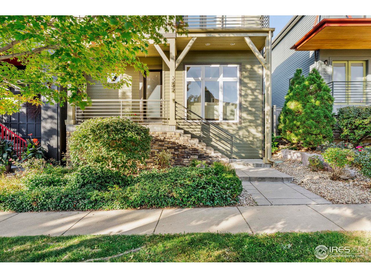5247 5th Street Boulder, CO 80304 - Photo 30 of 34 a front view of a house with a yard