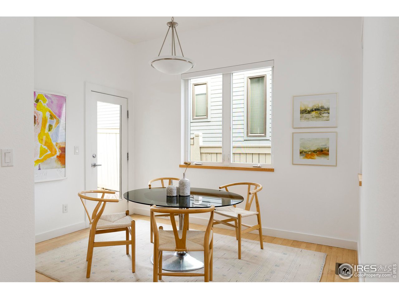 5247 5th Street Boulder, CO 80304 - Photo 9 of 34 a dining room with furniture and window