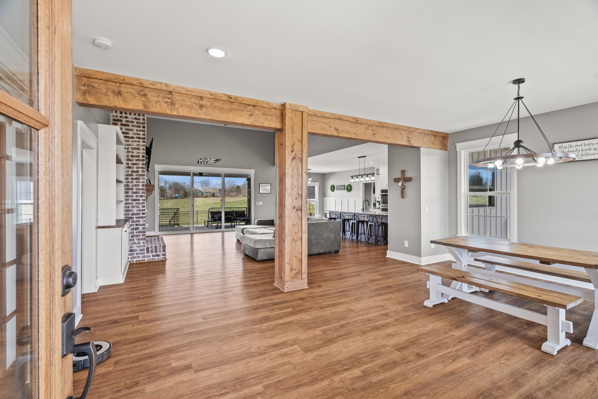 1155 Maxwell Branch Road Cottontown, TN 37048 - Photo 13 of 69 a room with wooden floor and furniture