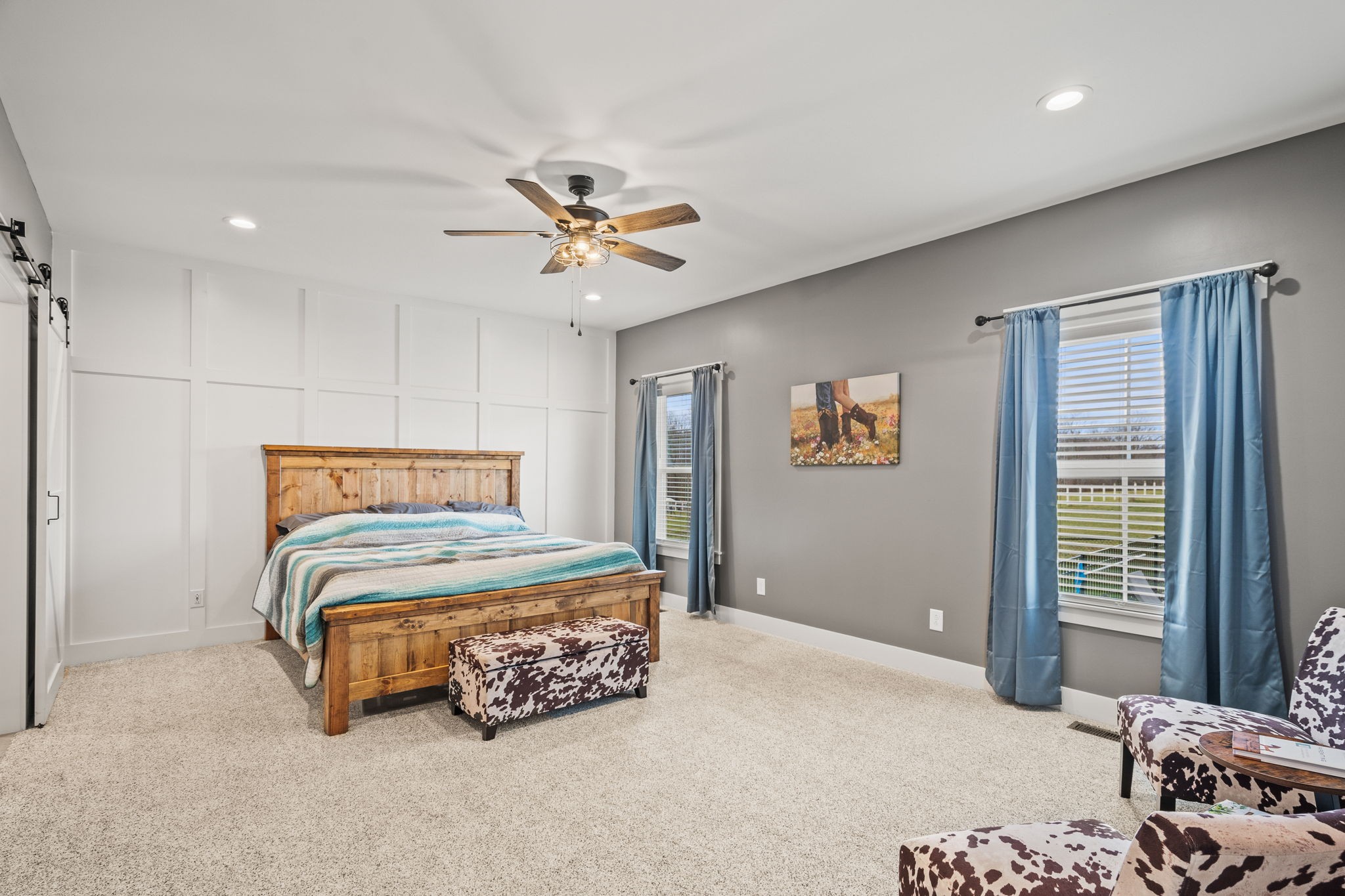 1155 Maxwell Branch Road Cottontown, TN 37048 - Photo 36 of 69 a bedroom with a bed and a chandelier