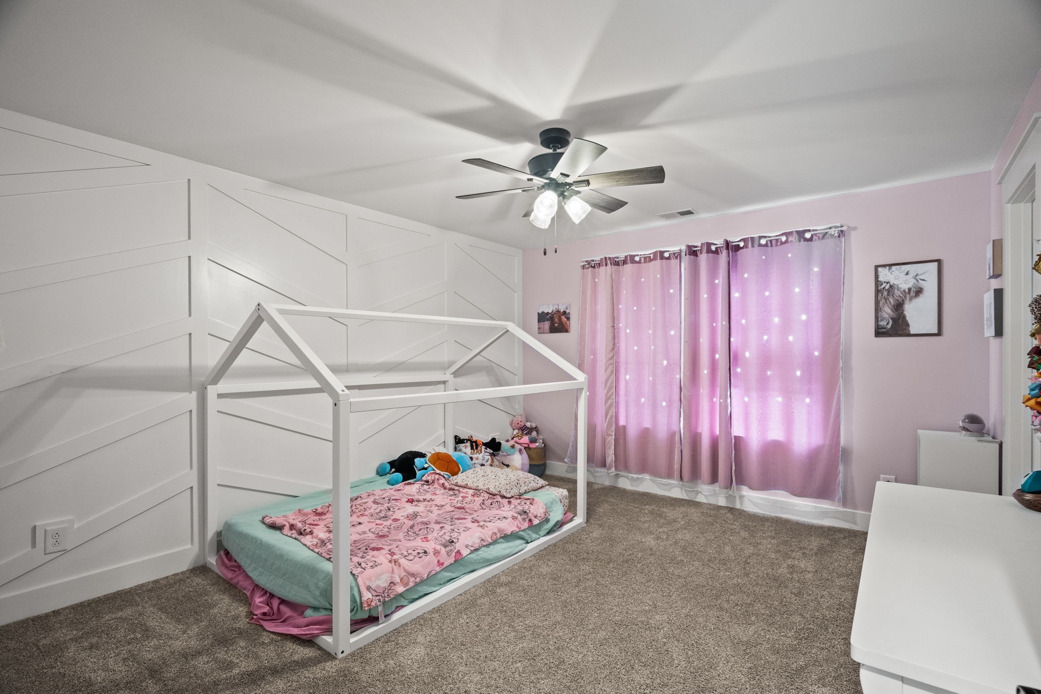 1155 Maxwell Branch Road Cottontown, TN 37048 - Photo 44 of 69 a bedroom with a bed and a chandelier