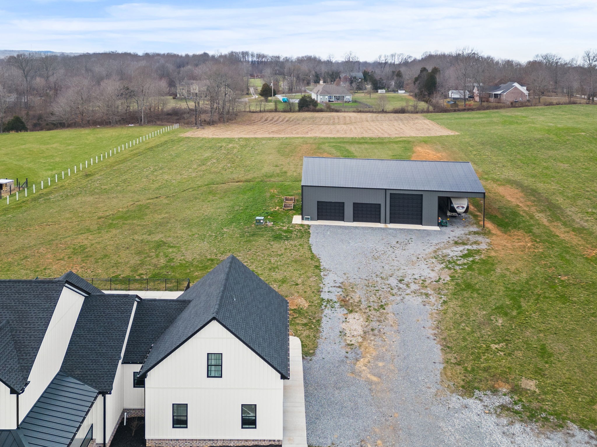 1155 Maxwell Branch Road Cottontown, TN 37048 - Photo 5 of 69 a aerial view of a house with a yard and lake view