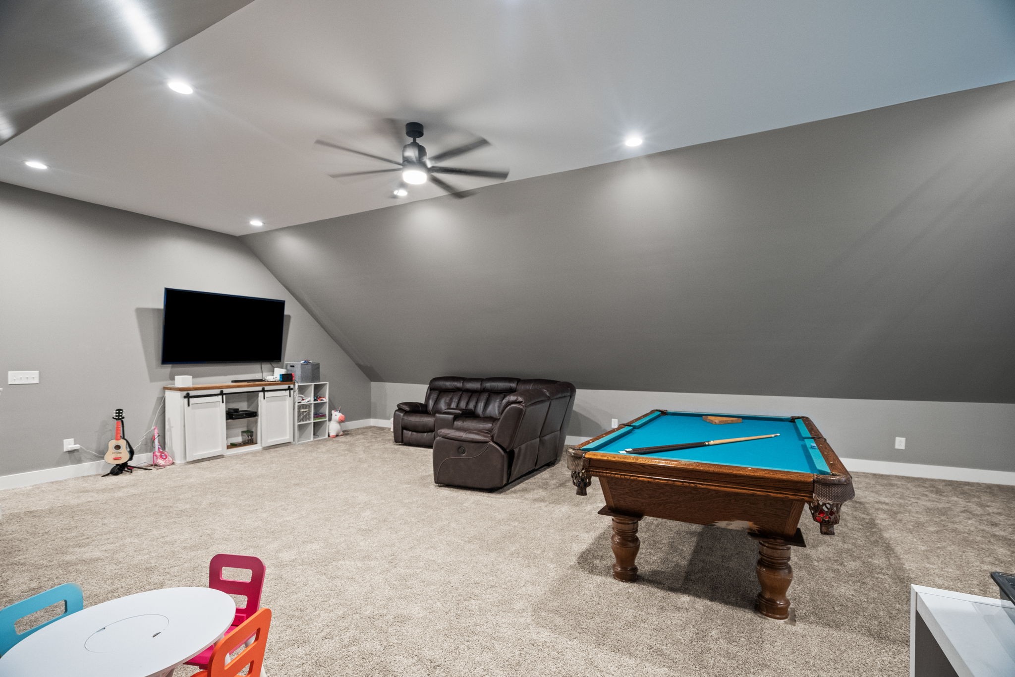 1155 Maxwell Branch Road Cottontown, TN 37048 - Photo 55 of 69 a living room with furniture and a flat screen tv