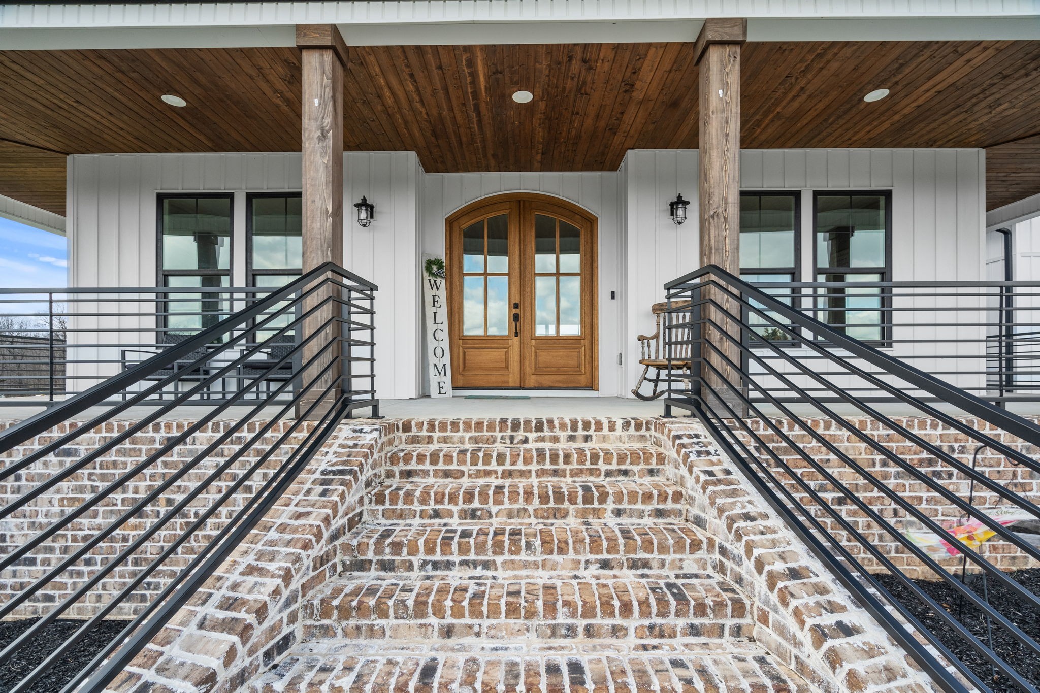 1155 Maxwell Branch Road Cottontown, TN 37048 - Photo 59 of 69 a front view of a house with a glass door