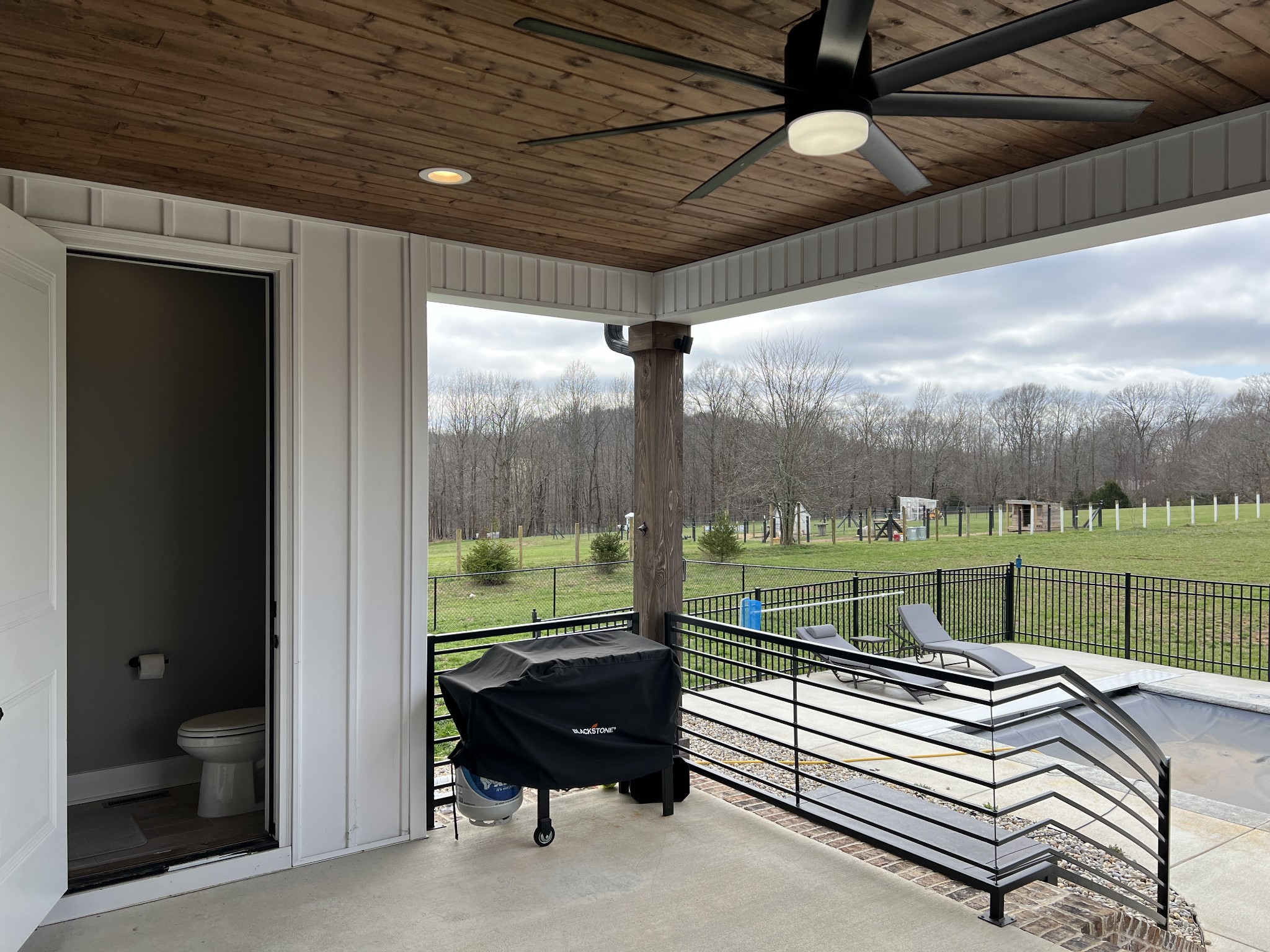 1155 Maxwell Branch Road Cottontown, TN 37048 - Photo 66 of 69 a view of a patio with a table chairs and a backyard