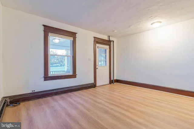 an empty room with window