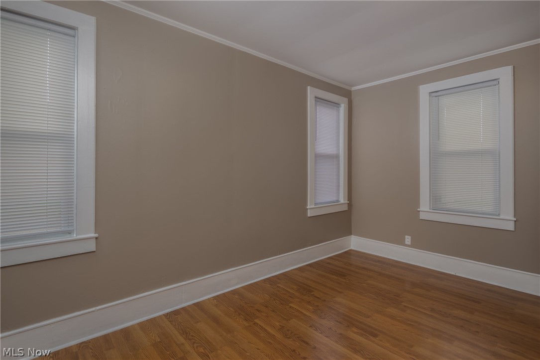 5117 Ridge Avenue Southeast Canton, OH 44707 - Photo 11 of 24 additional 1st floor bedroom! New laminate flooring and fresh paint!