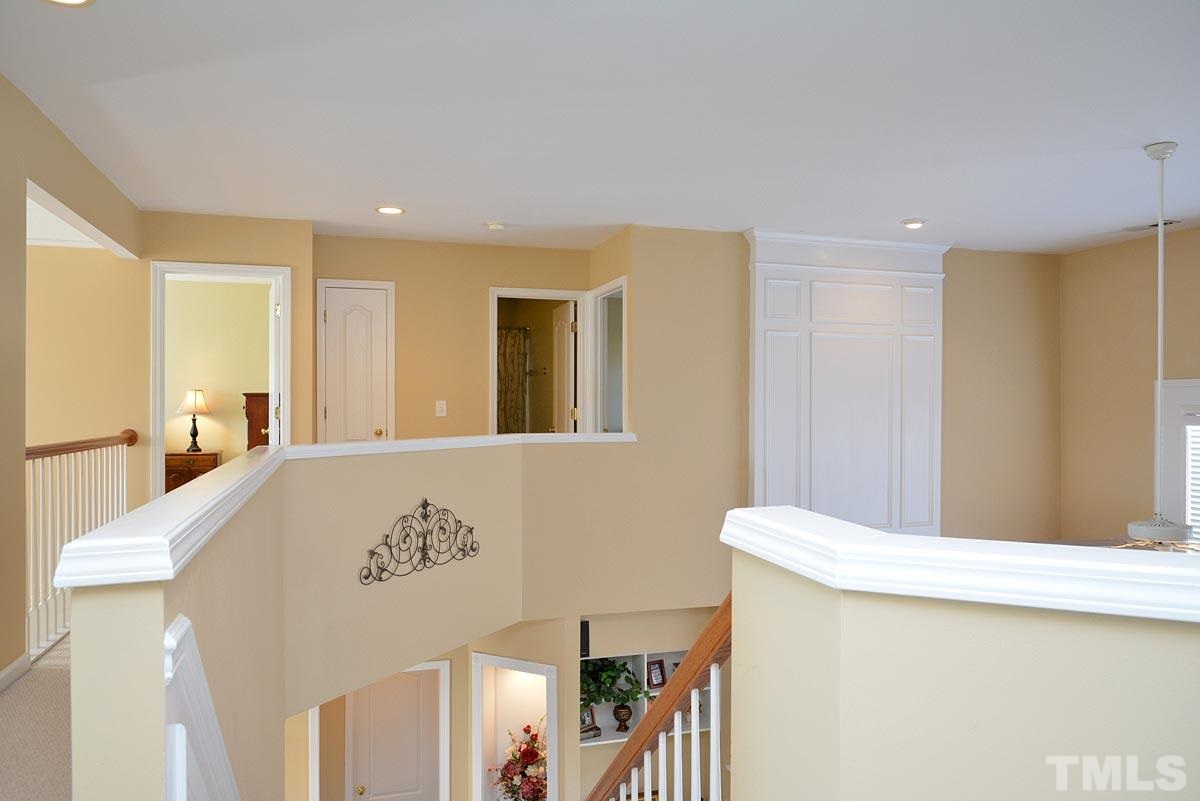 7748 Silver View Lane Raleigh, NC 27613 - Photo 14 of 25 a living room with a table and a window