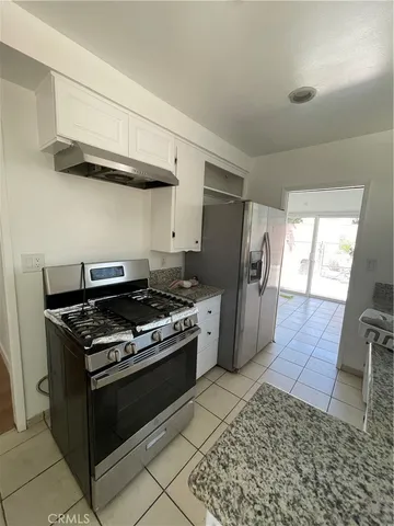 a view of a big room with wooden floor