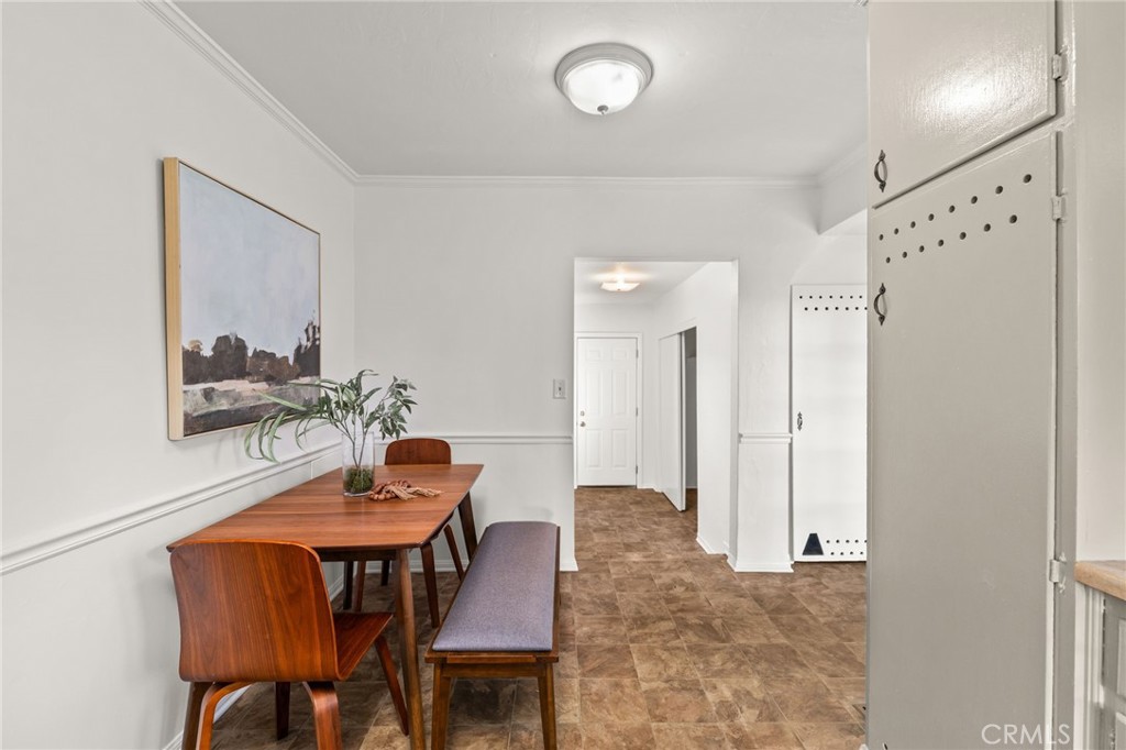 616 Monterey Street Redlands, CA 92373 - Photo 12 of 20 a view of a dining room with furniture