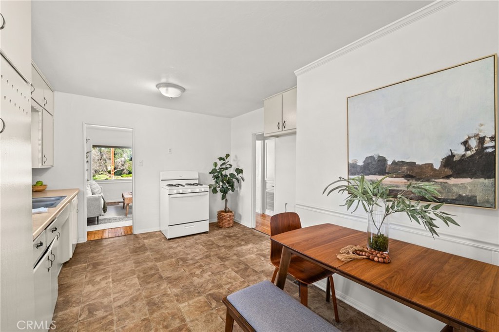 616 Monterey Street Redlands, CA 92373 - Photo 13 of 20 a living room with furniture and a table