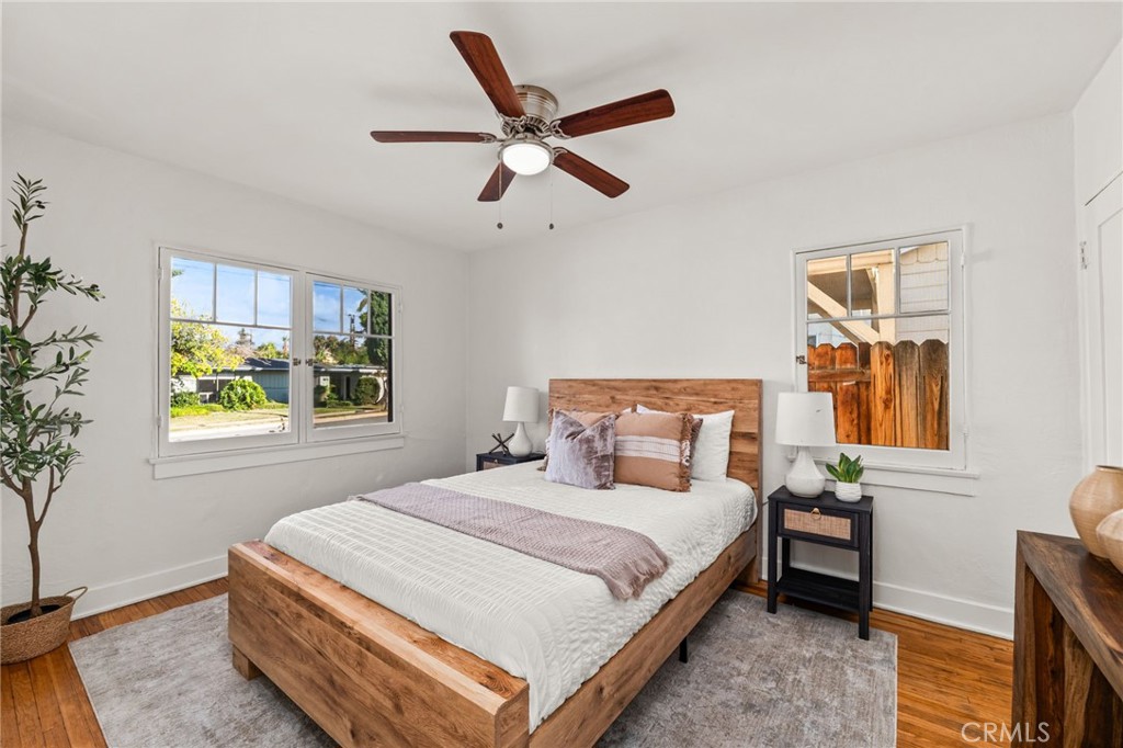 616 Monterey Street Redlands, CA 92373 - Photo 5 of 20 a bedroom with a bed and window