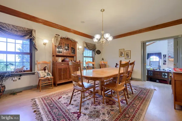 a view of a dining room with furniture