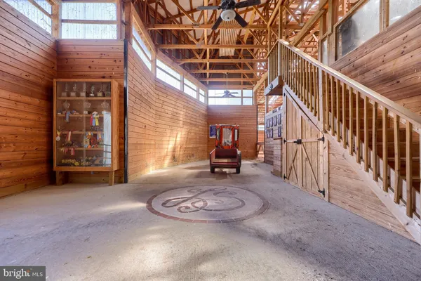 a view of a room with wooden walls