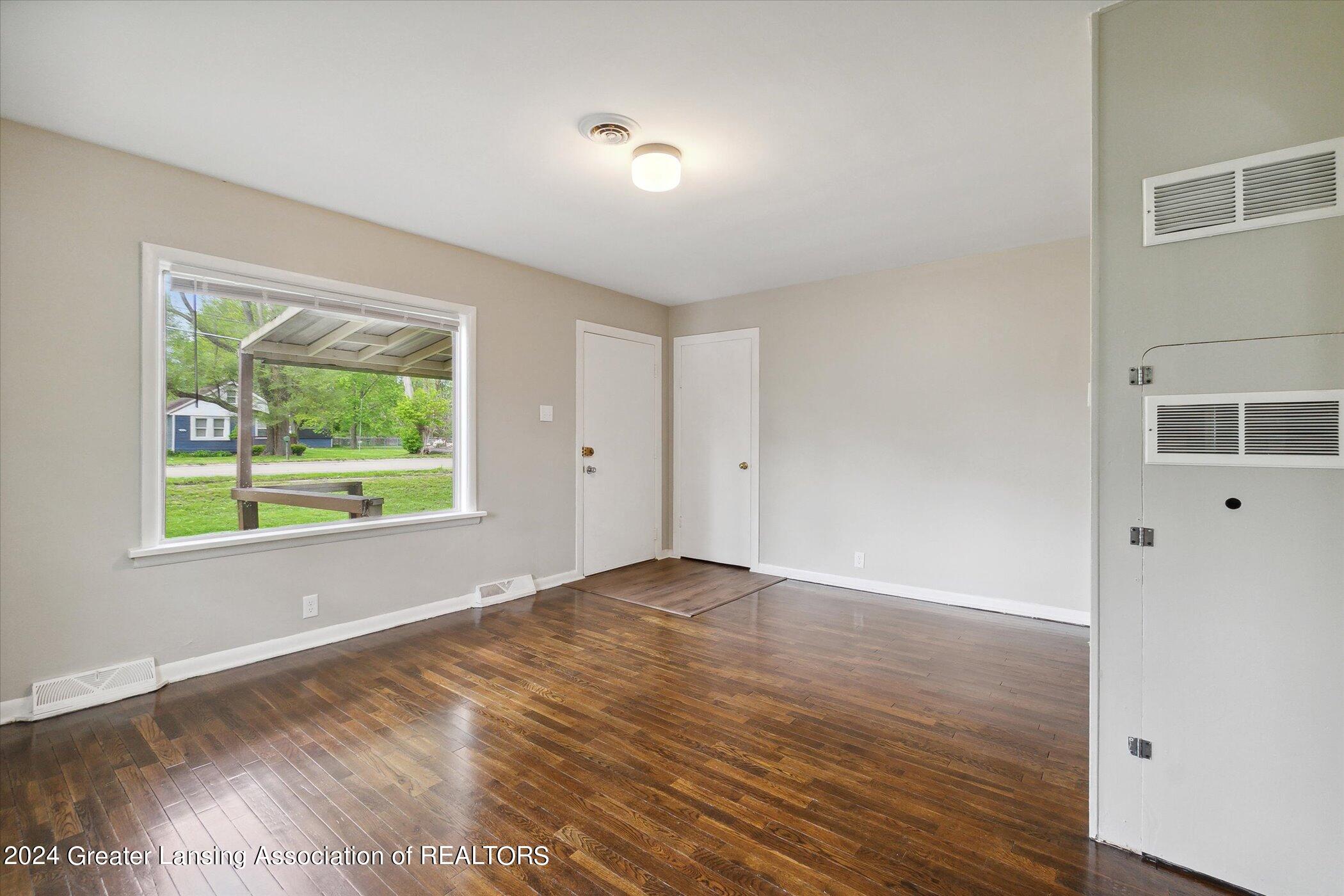 1821 West Jolly Road Lansing, MI 48910 - Photo 8 of 23 08-1821-W-Jolly-Rd-Lansing-MI-48910-Wind