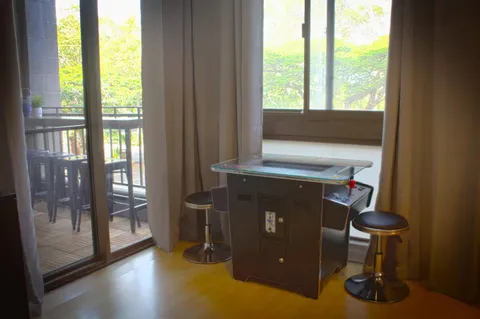 a kitchen with stainless steel appliances granite countertop a refrigerator and a stove