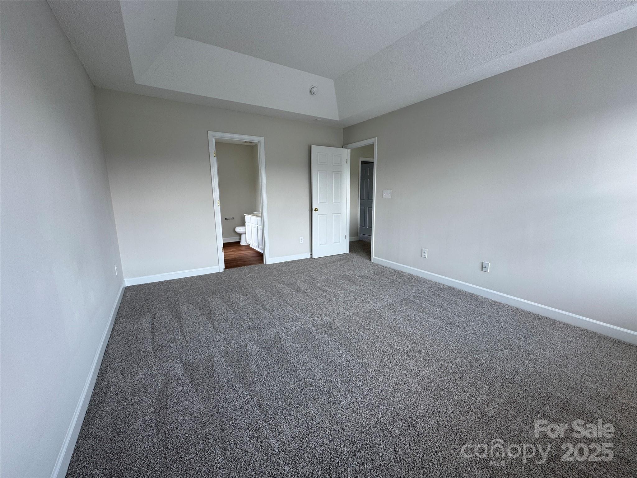 5506 Rogers Road Indian Trail, NC 28079 - Photo 20 of 30 a view of a room with wooden floor