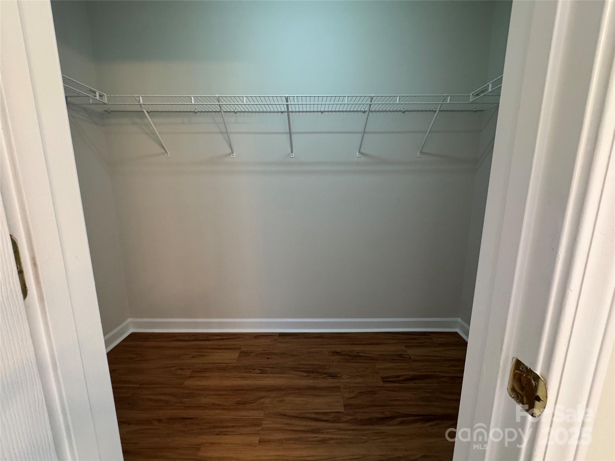 5506 Rogers Road Indian Trail, NC 28079 - Photo 24 of 30 a view of a room with wooden floor