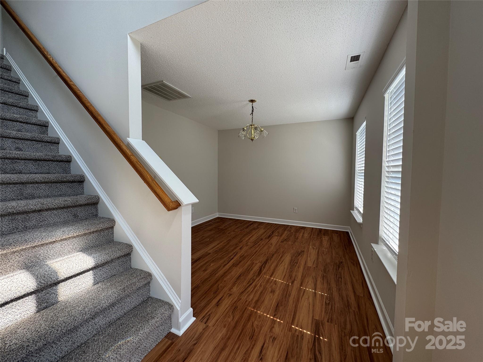 5506 Rogers Road Indian Trail, NC 28079 - Photo 4 of 30 a view of entryway and hall with wooden floor