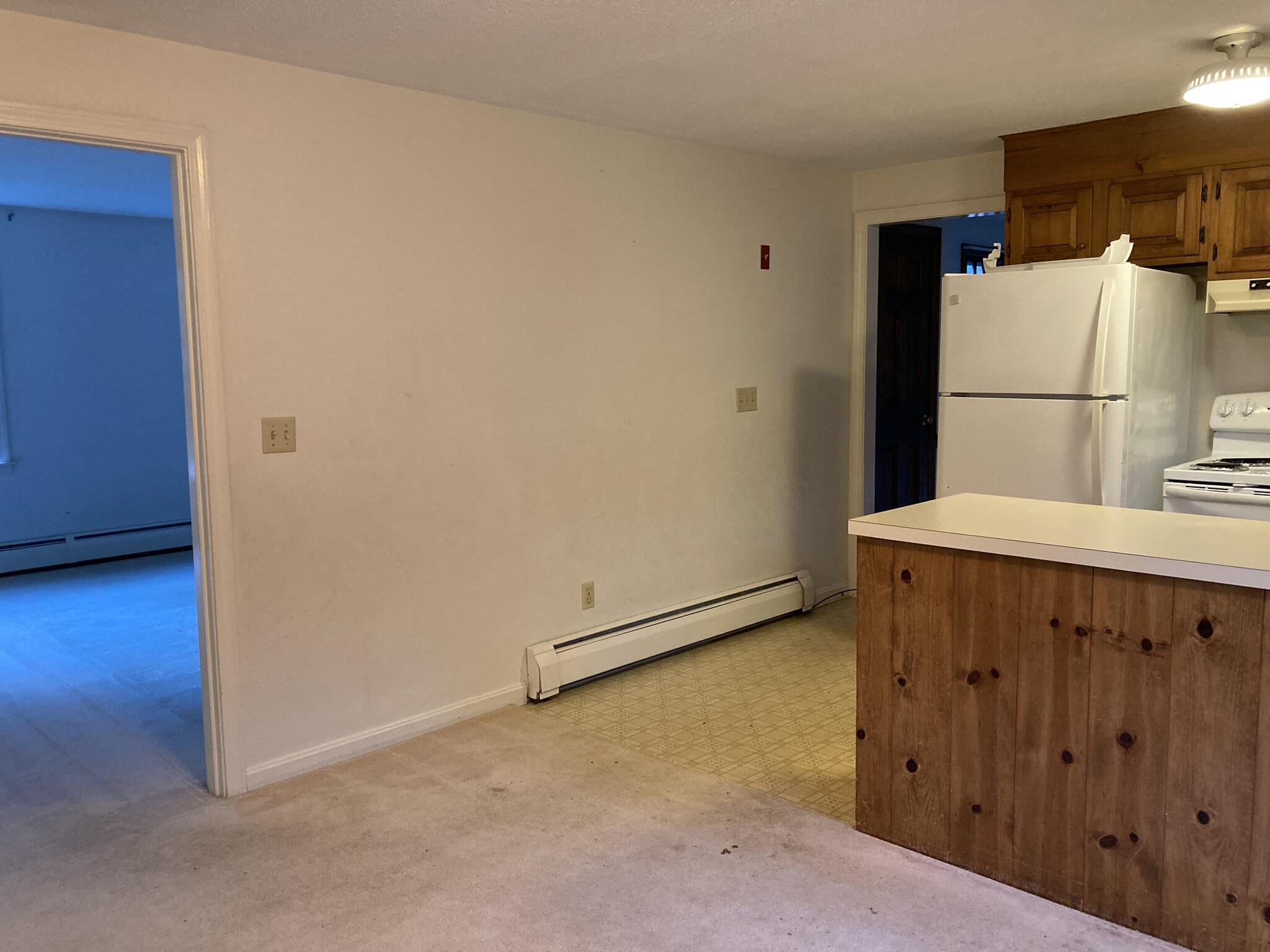 426 Nottingham Drive Centerville, MA 02632 - Photo 12 of 25 a kitchen with a refrigerator and a stove top oven