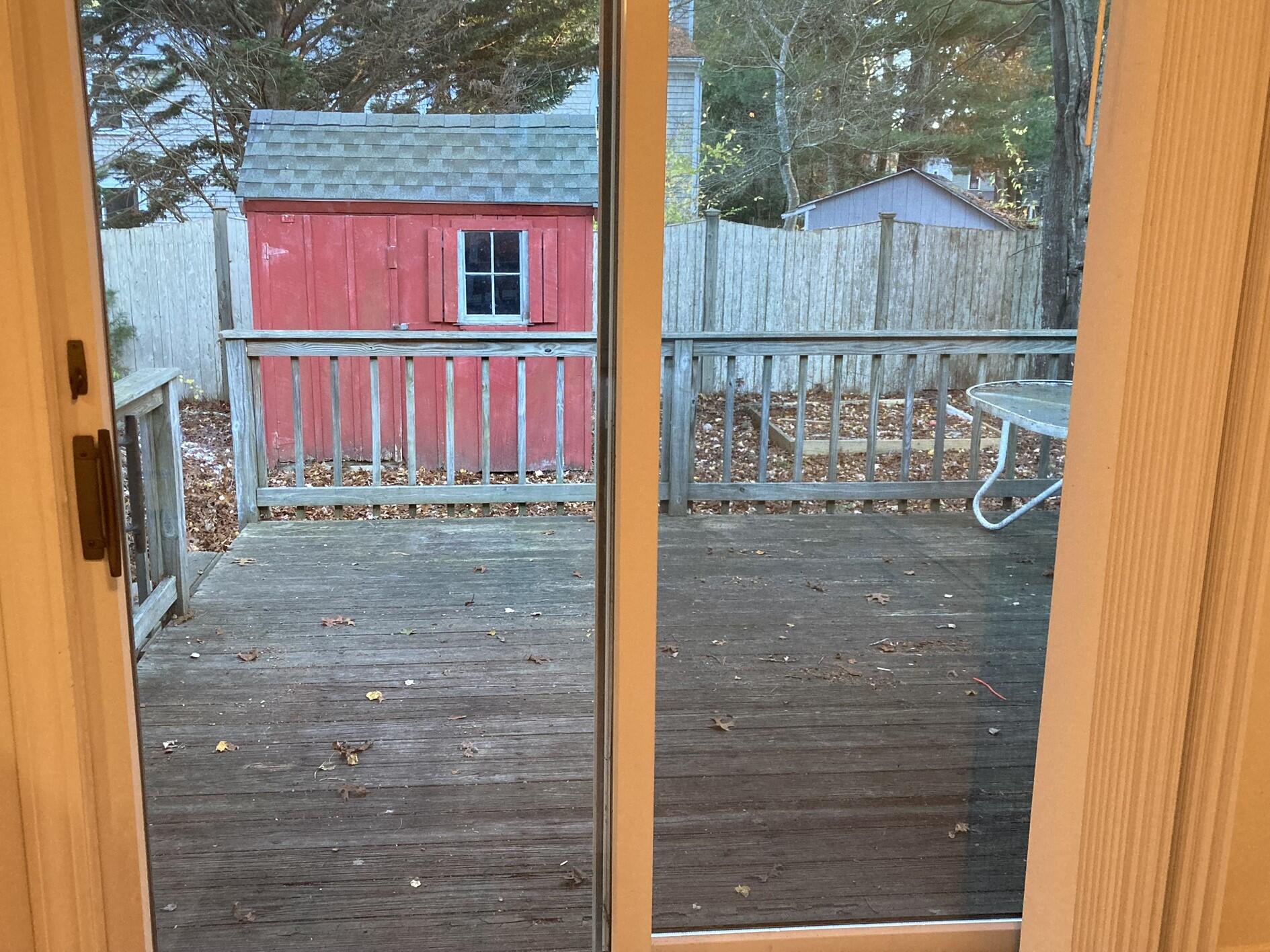 426 Nottingham Drive Centerville, MA 02632 - Photo 14 of 25 a view of a house with a yard