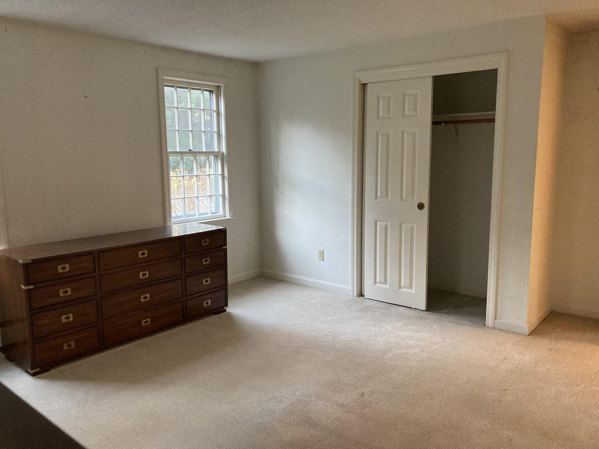 426 Nottingham Drive Centerville, MA 02632 - Photo 16 of 25 an empty room with windows and closet