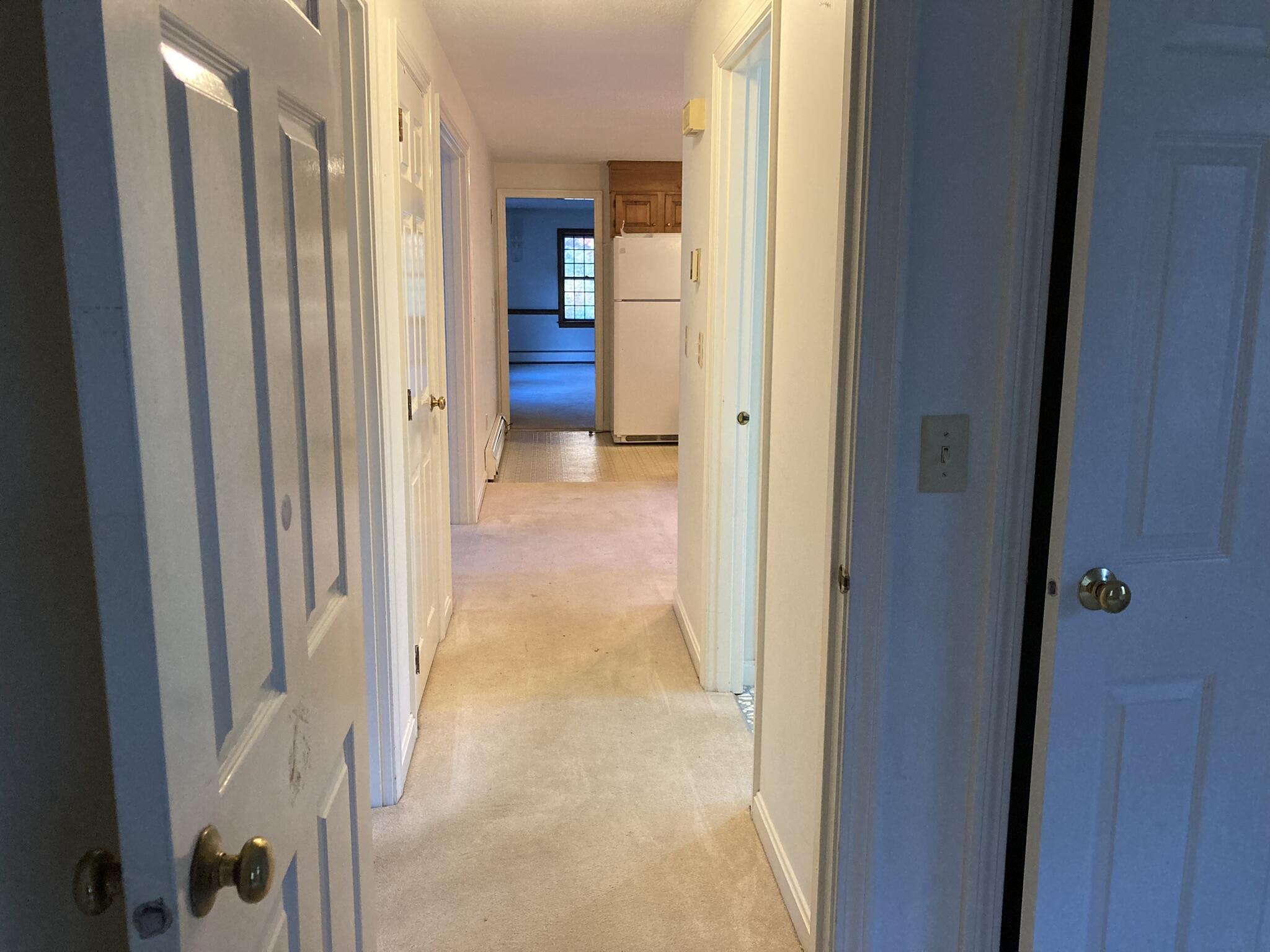 426 Nottingham Drive Centerville, MA 02632 - Photo 19 of 25 a view of a bathroom from a hallway