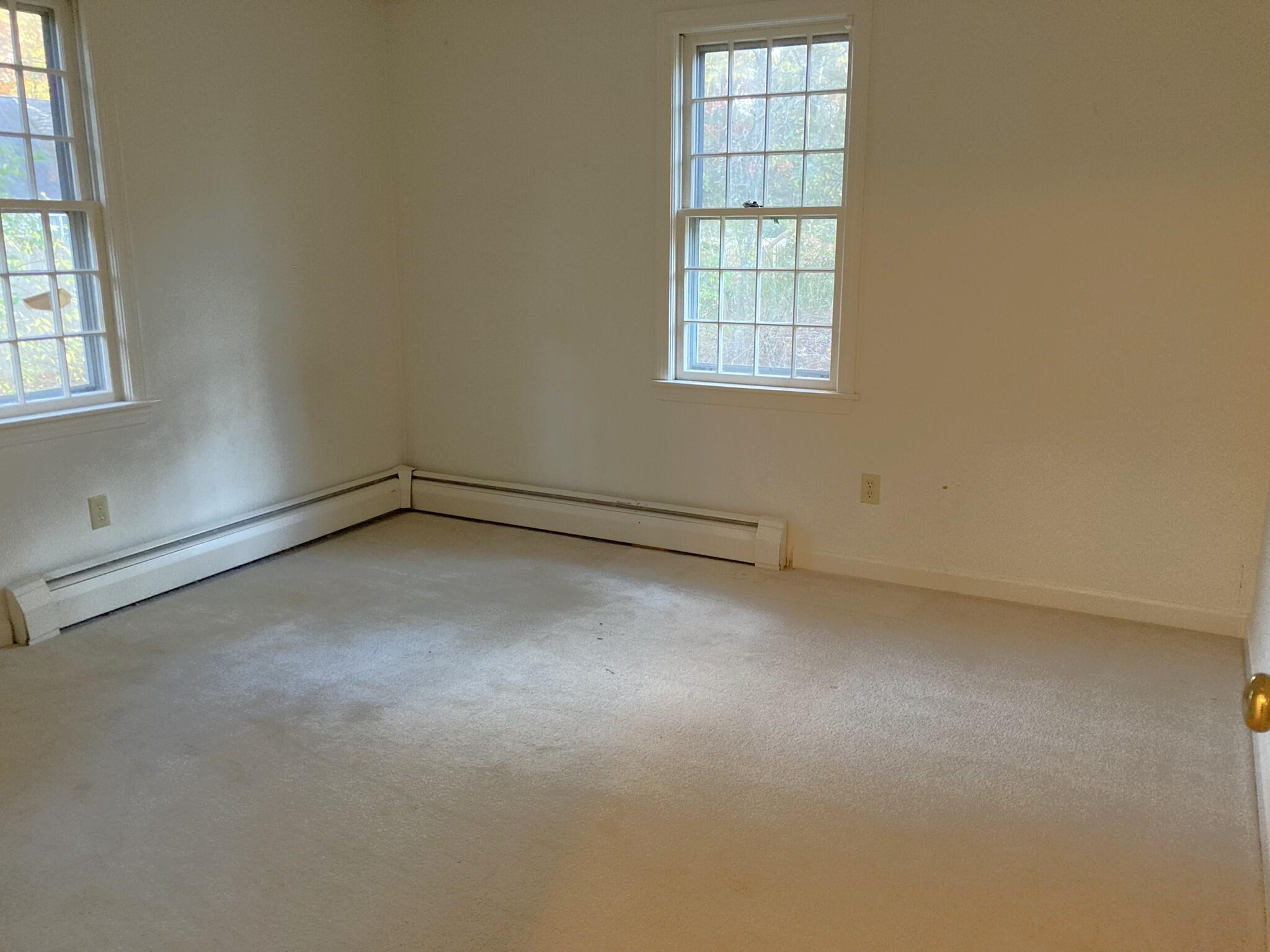 426 Nottingham Drive Centerville, MA 02632 - Photo 20 of 25 an empty room with windows